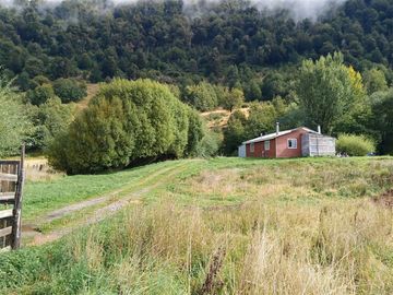 Parcela en venta en Coyhaique con casa mas quincho.