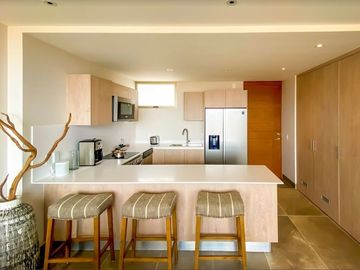 Apartamento a 6 minutos de la playa, alberca de adultos y familiar, residencial