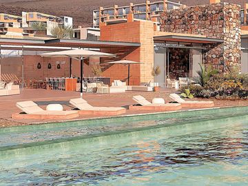 Apartamento a 6 minutos de la playa, alberca de adultos y familiar, residencial