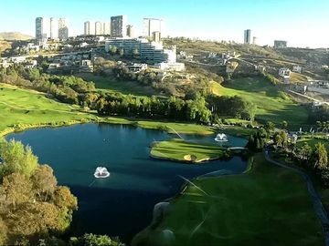 Macrolote comercial 12,477 m2 en residencial con campo de golf
