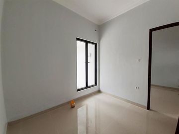 Rumah modern siap huni dalam cluster di Purwomartani
