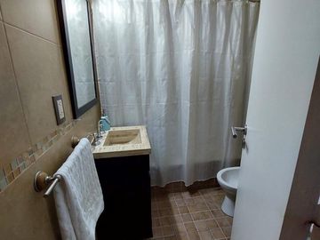 DEPARTAMENTO TRES AMBIENTES CON COCHERA (VENTA)