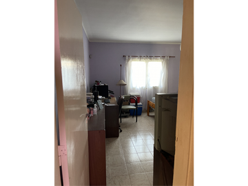 casa dos dormitorios y quincho sobre terreno de 400m2