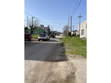 casa dos dormitorios y quincho sobre terreno de 400m2