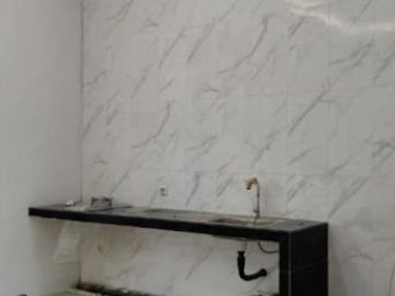 rumah baru di Sutorejo Timur Carport 2 mobil + garasi 1 mobil