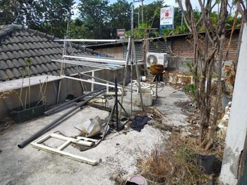 RUMAH+TOKO USAHA DHARMAWANGSA hdp utara, Strategis Nol jalan raya