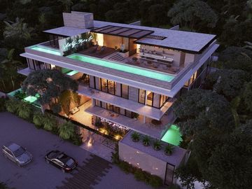 Departamento con jardín, acabados de lujo, alberca infinity, gimnasio