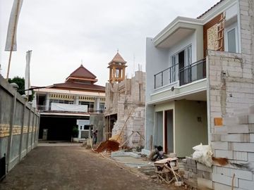 Rumah minimalis 2 lantai lokasi strategis diHarjamukti,Depok