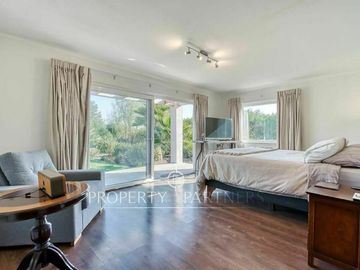 Moderna casa en condominio con cancha de golf en Piedra Roja