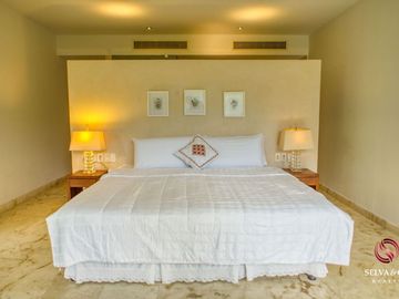 Departamento con plunge pool, terraza vista verde, venta Ikal Living Playacar