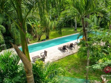 Departamento con plunge pool, terraza vista verde, venta Ikal Living Playacar