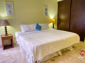 Departamento con plunge pool, terraza vista verde, venta Ikal Living Playacar