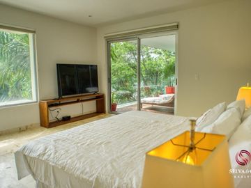 Departamento con plunge pool, terraza vista verde, venta Ikal Living Playacar
