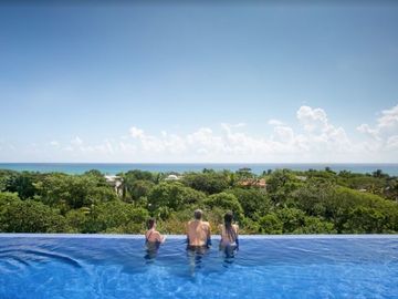 Departamento vista al mar desde la alberca, spa, gym, en Playacar venta