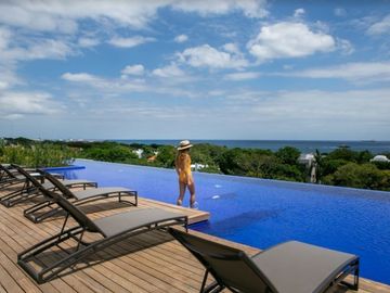Departamento vista al mar desde la alberca, spa, gym, en Playacar venta