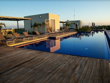 Departamento vista al mar desde la alberca, spa, gym, en Playacar venta