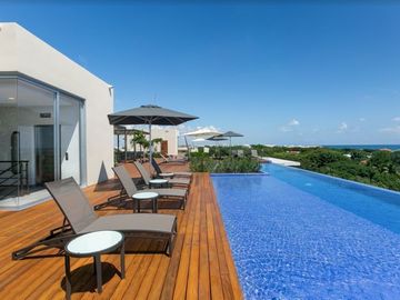 Departamento vista al mar desde la alberca, spa, gym, en Playacar venta