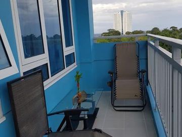 RFO beachfront Condo in AmiSa Private Residences Mactan
