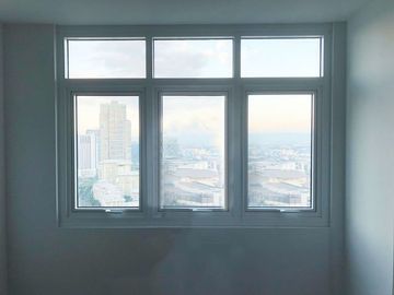 Semi-furnished studio for sale at Two Serendra
