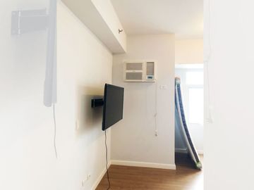 Semi-furnished studio for sale at Two Serendra