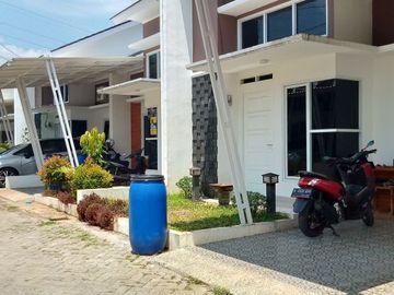 Rumah di Mustikajaya Bekasi siap huni bebas banjir one gate system pakai pos satpam,free BPHTB