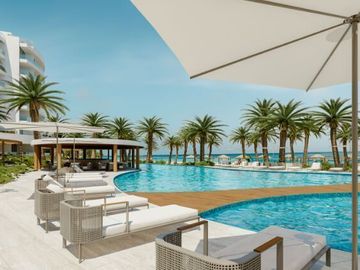 Condominio con terraza con vista al mar, alberca, cuarto lavado, venta, pre-cons