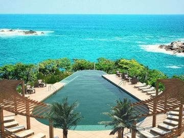 Condominio vista al mar, con club de playa y restaurante, 4 albercas, gimnasio