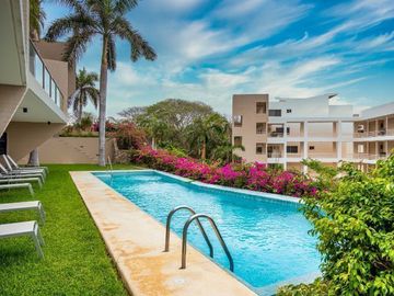 Condominio vista al mar, con club de playa y restaurante, 4 albercas, gimnasio