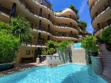 Penthouse de 2 recamaras con area de Asador frente al mar, amenidades de lujo.
