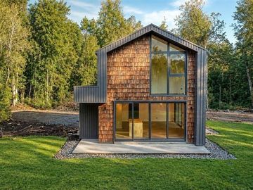 Casa Contemporánea inmersa en bosque nativo-3D/3B-El Bosque