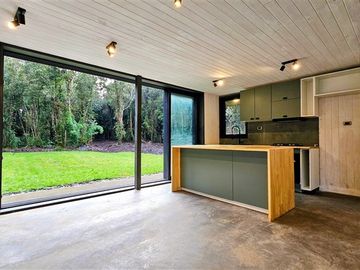Casa Contemporánea inmersa en bosque nativo-3D/3B-El Bosque