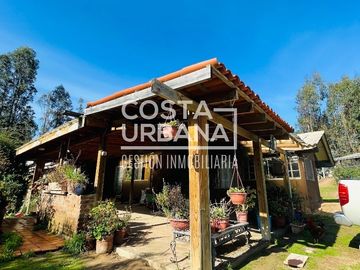 Encantadora parcela con casa en Melosilla
