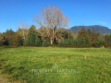 Terreno con orilla de río Huenehue