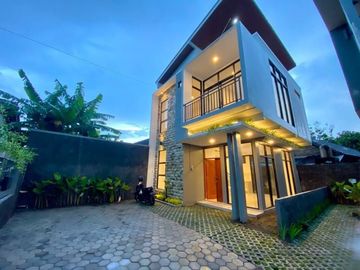 Dijual Rumah Siap Bangun Desain Tropis Minimalis Dalam Cluster