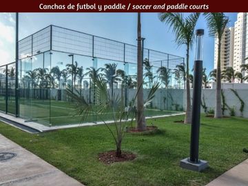 Condominio de lujo frente a marina, vistas al campo de golf y reserva natural. A