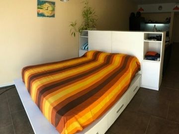 Impecable Monoambiente con COCHERA FIJA Y CUBIERTA
