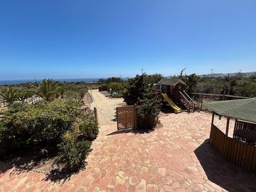 Sitio en Venta en Parcela en condominio Rocas de San Andrés sector 2, con amplia casa, quincho y piscina. Ruta 5 norte, KM 210, Totoralillo. (Borde Co