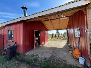 Parcela 5000 m2 con casa amoblada y tinaja en Curacautín