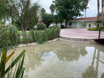 VENDO PALAPA CON PEQUEÑA CASA EN FRACCIONAMIENTO LA HUARACHA LEON UNA HECTAREA