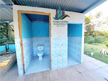 VENDO CABAÑA EN LOTE 1295 M2  CON QUEBRADA- BOQUETE