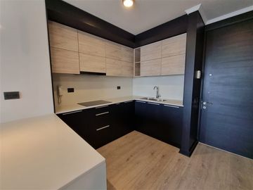 Departamento en venta de 1 dorm en Lo Barnechea - SEMI NUEVO