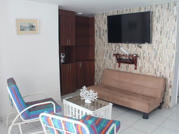 HERMOSO Y ACOGEDOR DEPARTAMENTO UBICADO EN MODERNO CONDOMINIO FRENTE AL MAR