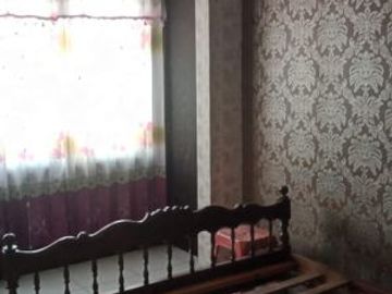 Rumah 2 Lantai Kuning Minimalis di Tegal Besar Jember