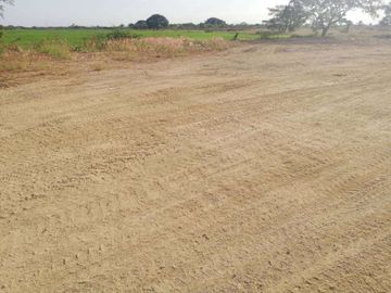 Venta terreno 2700m2 via al PAN, rellenado, compactado. Ideal para bodegas, talleres o fábricas. Sector industrial.