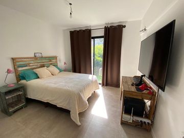 Departamento con jardín en Ecoaldea, Pilar