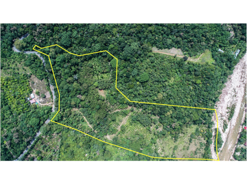 TERRENO CON SALIDA AL RIO CUMBAZA Y CARRETERA