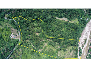TERRENO CON SALIDA AL RIO CUMBAZA Y CARRETERA