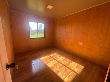Parcela 5000 m2 con casa y borde estero en Curacautín