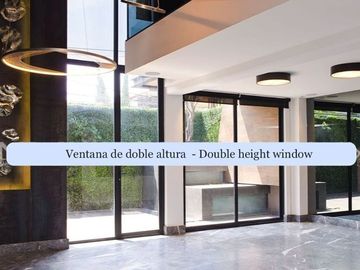 Condominio de lujo con terraza, doble altura, dos plantas, bodega, obra de arte,