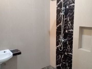 Rumah Modern Minimalis Bukit Palma Citraland Surabaya